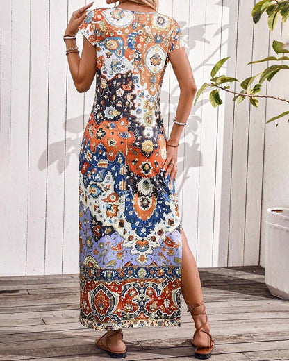 Van Elst Mode® | Kleurrijke casual jurk met print en splitten