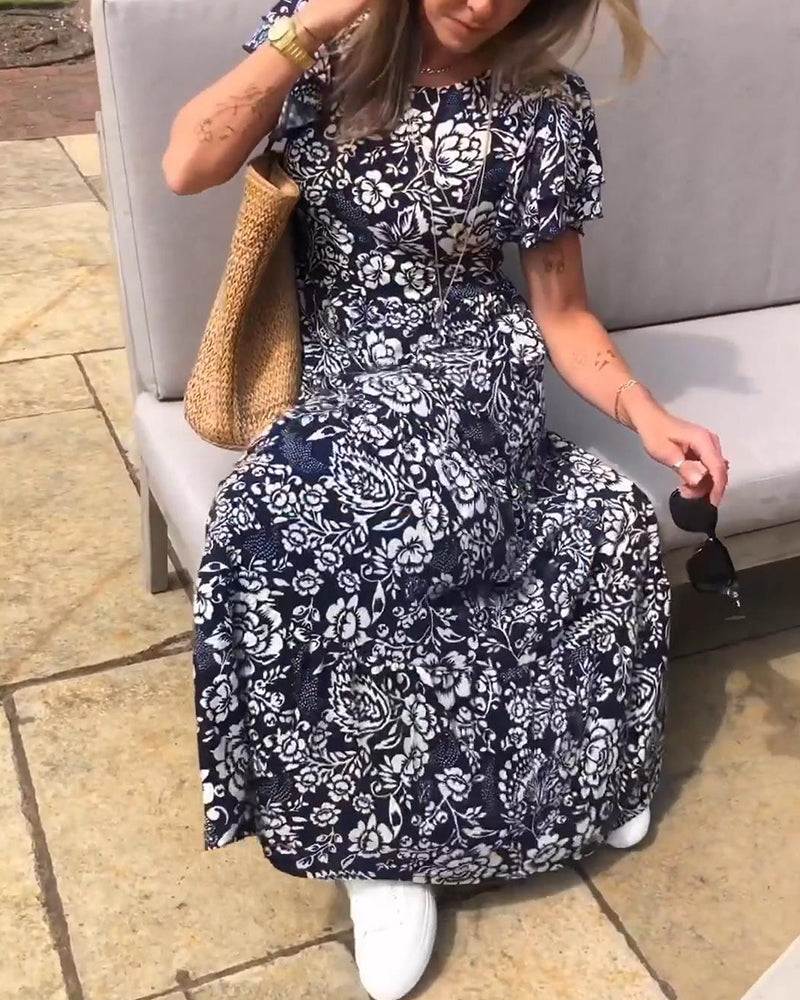 Van Elst Mode® | Lange jurk met korte mouwen en bloemenprint