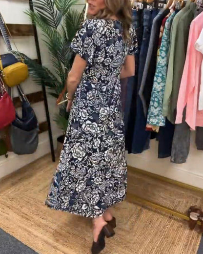 Van Elst Mode® | Lange jurk met korte mouwen en bloemenprint