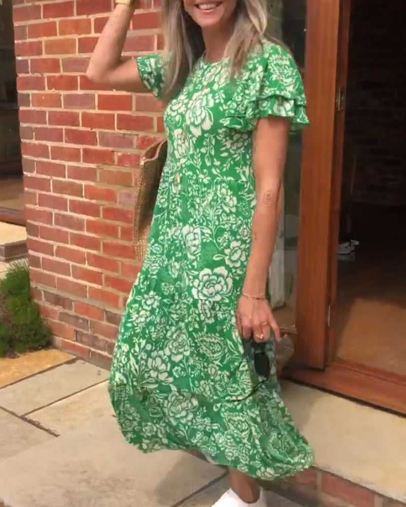 Van Elst Mode® | Lange jurk met korte mouwen en bloemenprint